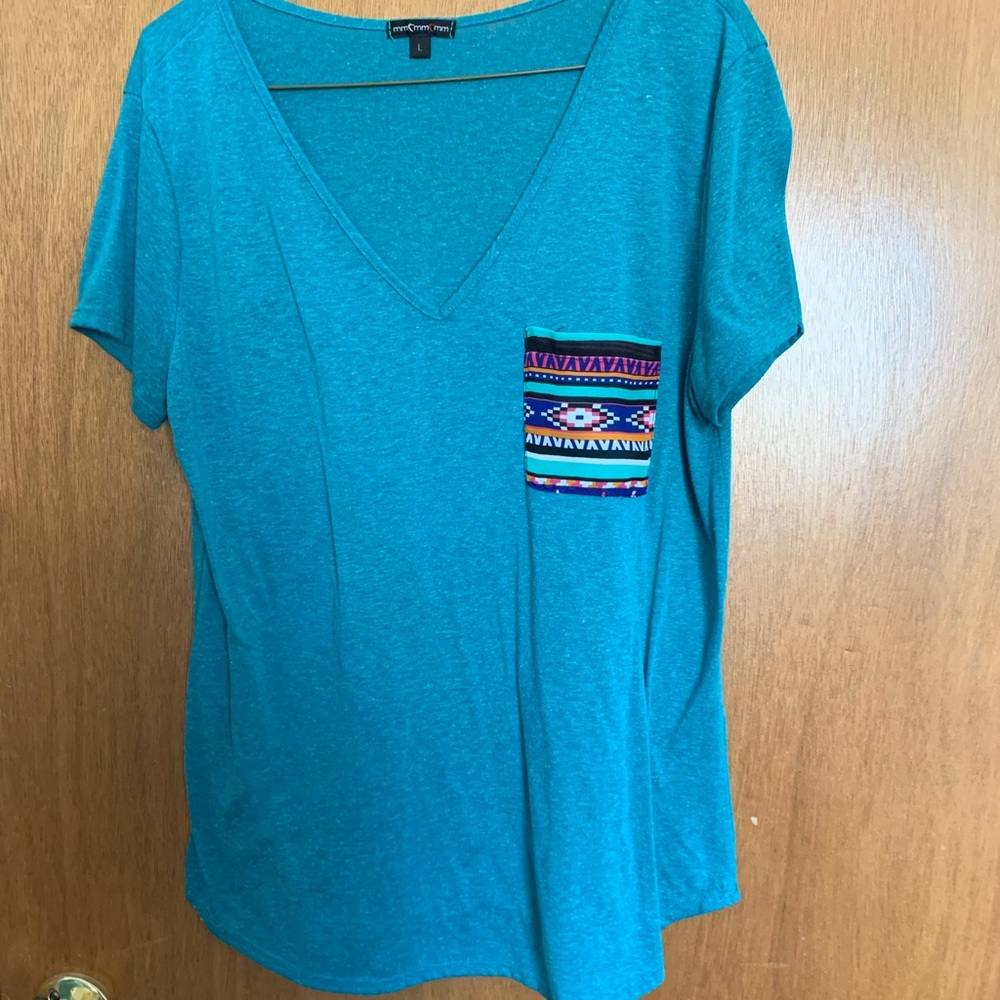 Blue top with pocket detail